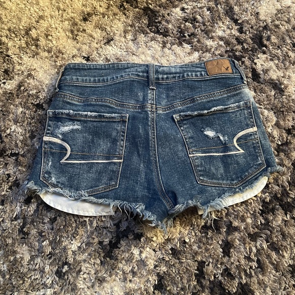 Hi-Rise Distressed Jean Shorts - Picture 8 of 9